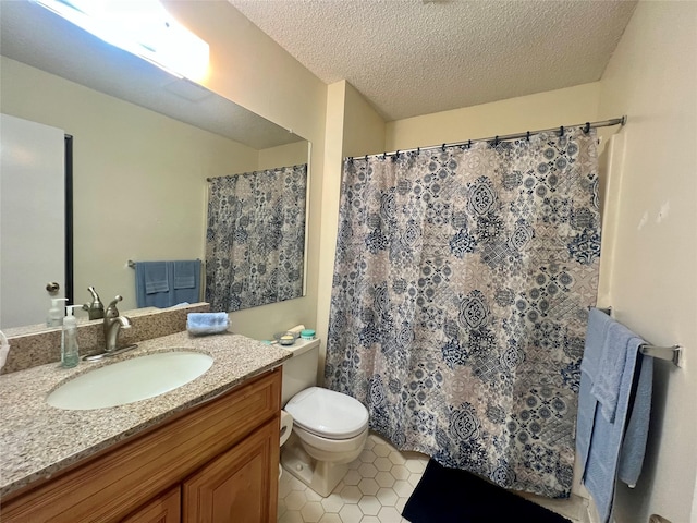 55 Winchester Ave, Peekskill, NY 10566 - bathroom featuring toilet, vanity, tile patterned floors, a textured ceiling, and curtained shower