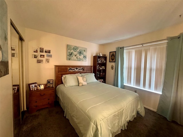55 Winchester Ave, Peekskill, NY 10566 - carpeted bedroom with a textured ceiling