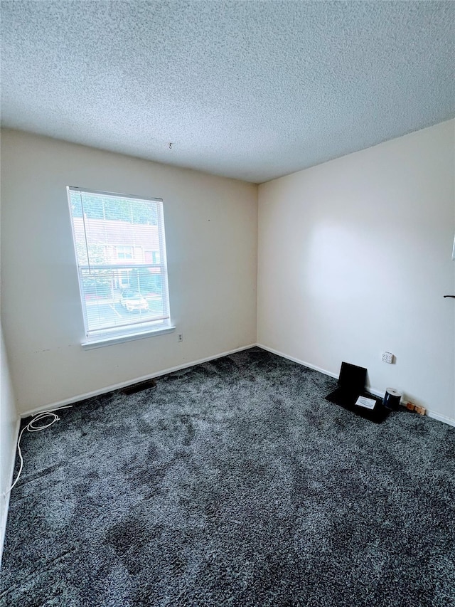 55 Winchester Ave, Peekskill, NY 10566 - unfurnished room featuring carpet floors, a textured ceiling, and baseboards