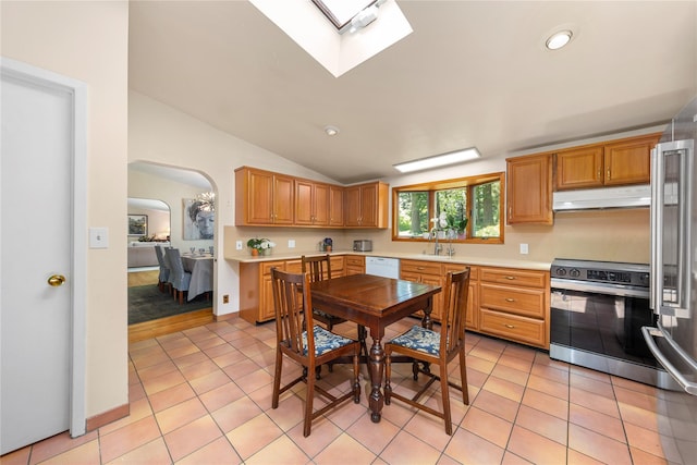 6 Harbor Hill Dr, Lloyd Harbor, NY 11743 - kitchen featuring stove, under cabinet range hood, dishwasher, light countertops, and vaulted ceiling
