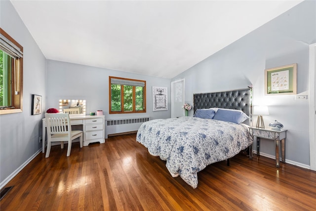 6 Harbor Hill Dr, Lloyd Harbor, NY 11743 - bedroom with radiator, wood finished floors, vaulted ceiling, and baseboards