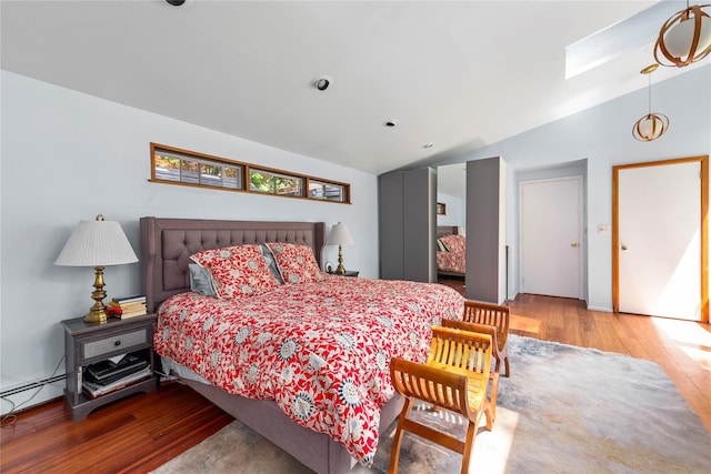 6 Harbor Hill Dr, Lloyd Harbor, NY 11743 - bedroom with wood finished floors and lofted ceiling