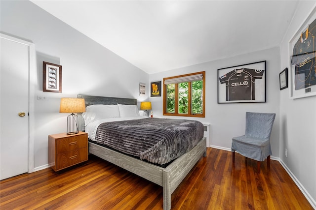 6 Harbor Hill Dr, Lloyd Harbor, NY 11743 - bedroom with wood finished floors, baseboards, and vaulted ceiling