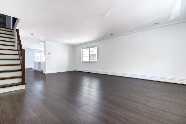 22 May Pl, Staten Island, NY 10312 - unfurnished living room featuring stairway, baseboards, and dark wood-style flooring