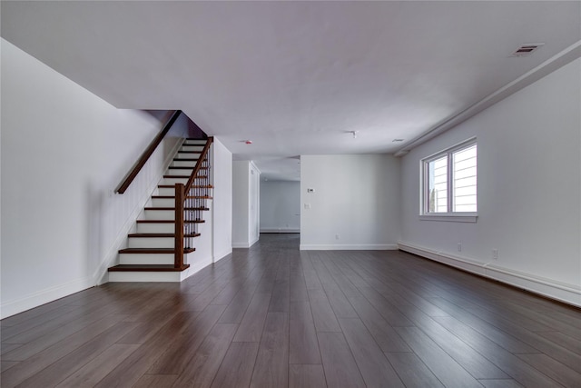 22 May Pl, Staten Island, NY 10312 - unfurnished living room with stairway, dark wood-type flooring, and baseboards