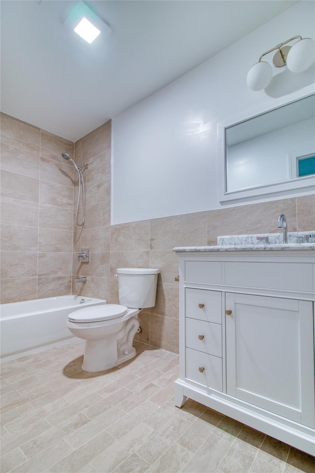 22 May Pl, Staten Island, NY 10312 - full bath featuring toilet, washtub / shower combination, vanity, and tile walls