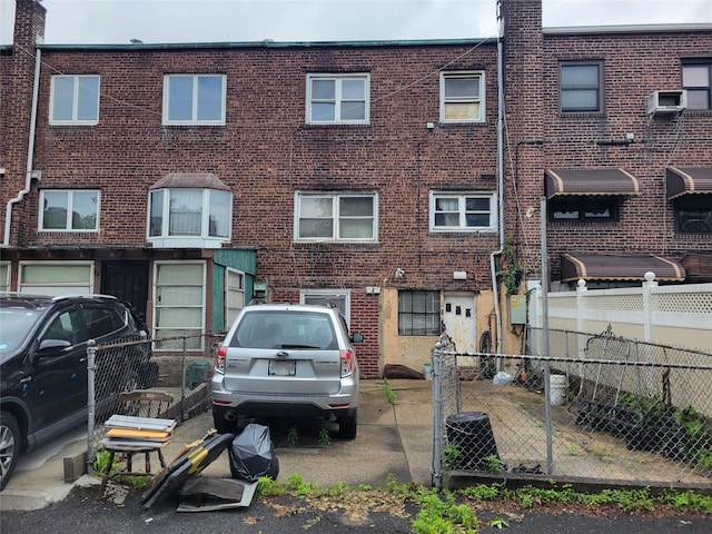 48-16 65th St, Woodside, NY 11377 - rear view of house with brick siding