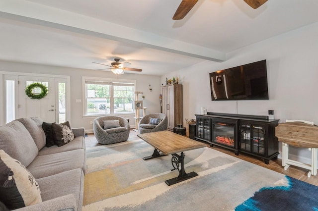 130 Shenandoah Blvd N, Nesconset, NY 11767 - living area featuring ceiling fan, a fireplace, baseboards, and beam ceiling