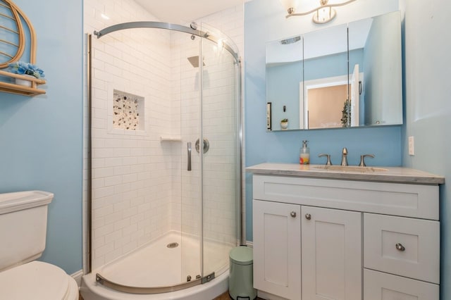 130 Shenandoah Blvd N, Nesconset, NY 11767 - full bathroom featuring toilet, a stall shower, and vanity
