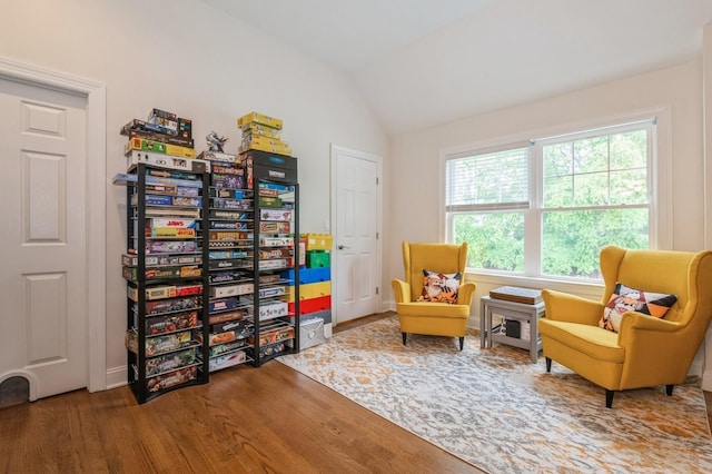 130 Shenandoah Blvd N, Nesconset, NY 11767 - sitting room featuring wood finished floors and vaulted ceiling