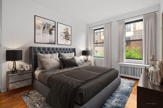 3656 Johnson Ave Unit 4G, Bronx, NY 10463 - bedroom featuring radiator heating unit and wood finished floors