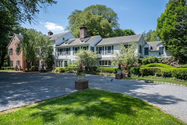8 Chicken Valley Rd, Old Brookville, NY 11545 - view of front of property with a chimney and driveway