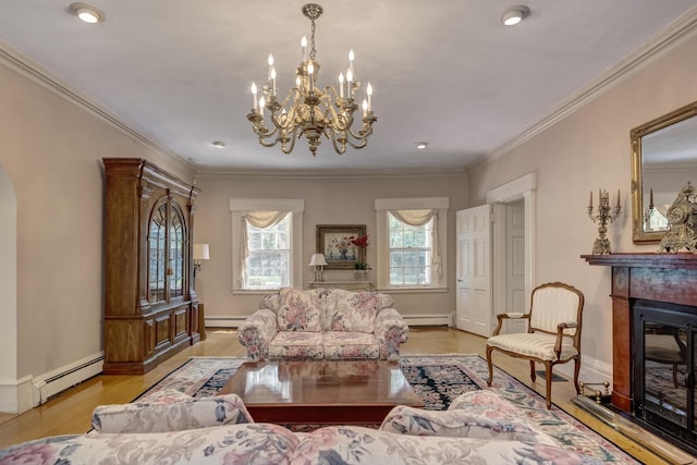 8 Chicken Valley Rd, Old Brookville, NY 11545 - living room with a baseboard heating unit, a glass covered fireplace, light wood-style flooring, and crown molding