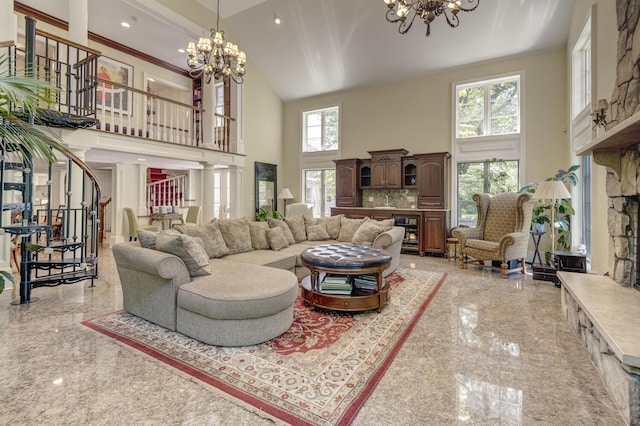 8 Chicken Valley Rd, Old Brookville, NY 11545 - living area with a chandelier, a towering ceiling, granite tiled floors, and healthy amount of natural light