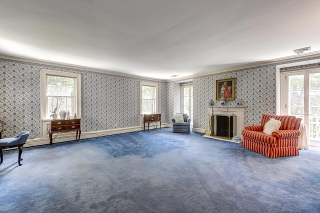 8 Chicken Valley Rd, Old Brookville, NY 11545 - living area with wallpapered walls, ornamental molding, healthy amount of natural light, a fireplace, and carpet floors