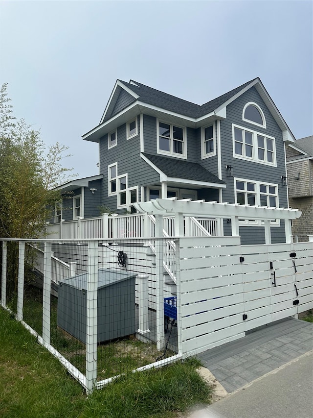 24 Bungalow Walk, Ocean Beach, NY 11770 - view of home's exterior with a shingled roof
