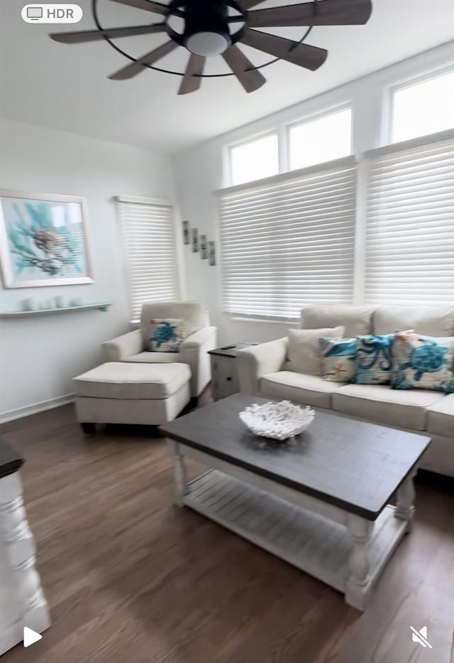 24 Bungalow Walk, Ocean Beach, NY 11770 - living area with a ceiling fan, plenty of natural light, wood finished floors, and baseboards