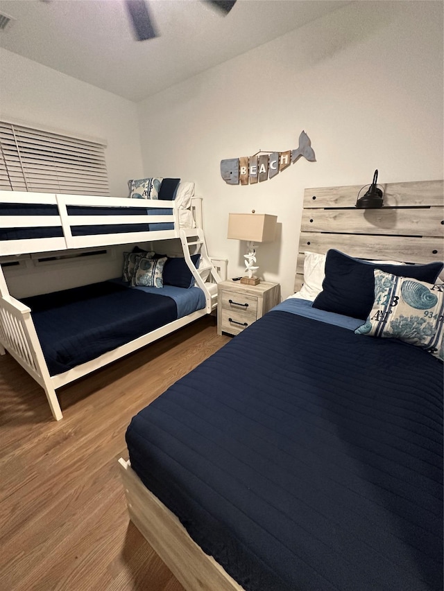 24 Bungalow Walk, Ocean Beach, NY 11770 - bedroom with wood finished floors and ceiling fan