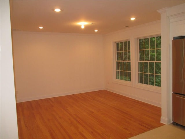 29 Carpenter Ave Unit B3, Mount Kisco, NY 10549 - empty room with crown molding, light wood-style flooring, recessed lighting, and baseboards