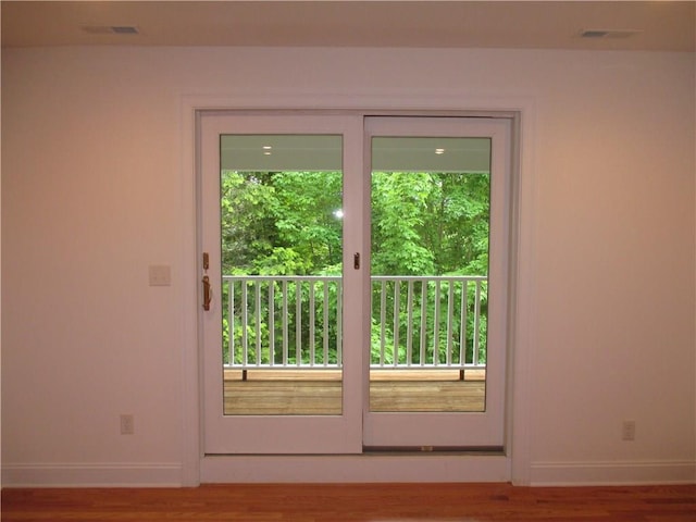 29 Carpenter Ave Unit B3, Mount Kisco, NY 10549 - entryway with baseboards, wood finished floors, and plenty of natural light