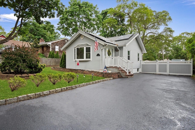 8 Lafayette Ave, Lake Grove, NY 11755 - ranch-style house featuring roof mounted solar panels