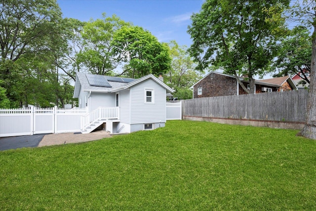 8 Lafayette Ave, Lake Grove, NY 11755 - back of property featuring roof mounted solar panels