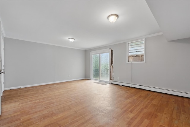 1668 Rte 9 Unit 10D, Wappingers Falls, NY 12590 - unfurnished room featuring ornamental molding, a baseboard heating unit, light wood-style floors, cooling unit, and baseboards