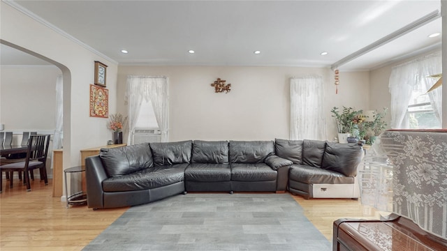 68-37 Kessel St, Forest Hills, NY 11375 - living area with light wood-style flooring, arched walkways, ornamental molding, and recessed lighting