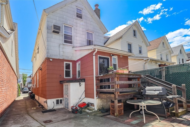 68-37 Kessel St, Forest Hills, NY 11375 - back of house with a chimney