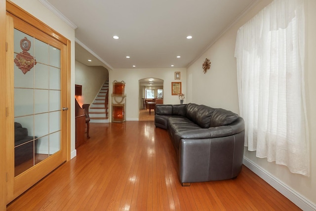 68-37 Kessel St, Forest Hills, NY 11375 - living area featuring arched walkways, stairs, hardwood / wood-style flooring, baseboards, and recessed lighting
