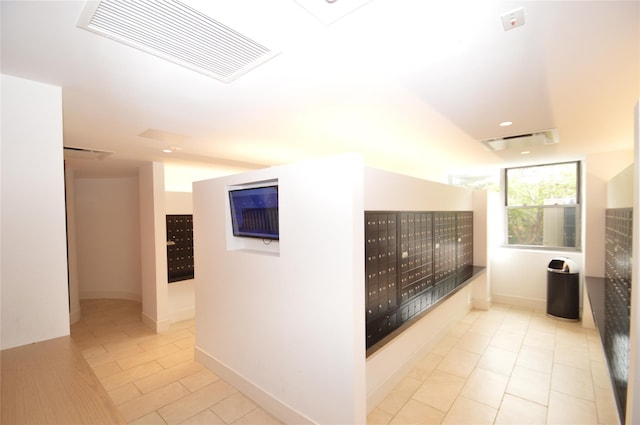 70-25 Yellow Stone Blvd Unit 10Z, Forest Hills, NY 11375 - hallway with mail area and tile patterned floors