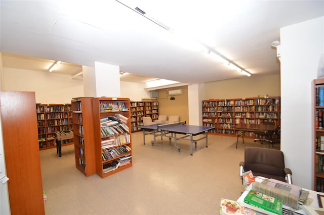 70-25 Yellow Stone Blvd Unit 10Z, Forest Hills, NY 11375 - recreation room featuring a wall mounted air conditioner