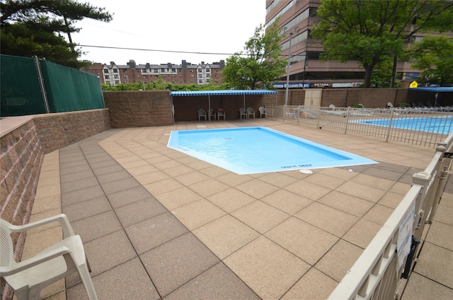 70-25 Yellow Stone Blvd Unit 10Z, Forest Hills, NY 11375 - community pool with a patio area