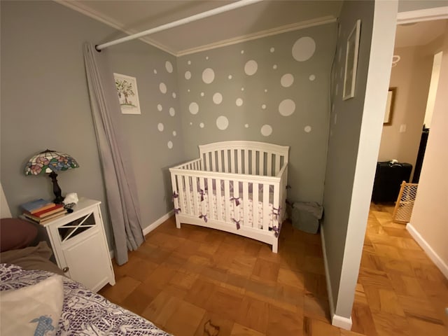 70-25 Yellow Stone Blvd Unit 10Z, Forest Hills, NY 11375 - bedroom with ornamental molding, a crib, and baseboards