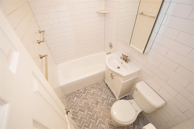 70-25 Yellow Stone Blvd Unit 10Z, Forest Hills, NY 11375 - full bathroom featuring vanity, tile walls, and tub / shower combination