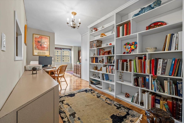 555 Kappock St Unit 17D, Bronx, NY 10463 - office with a chandelier, wood finished floors, and built in shelves