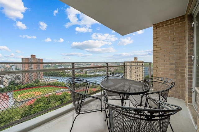 555 Kappock St Unit 17D, Bronx, NY 10463 - balcony with a view of city and outdoor dining space