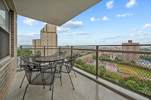 555 Kappock St Unit 17D, Bronx, NY 10463 - balcony with a view of city and outdoor dining space