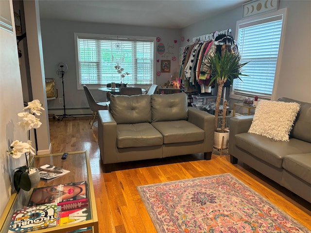 133-50 123rd St Unit 2, South Ozone Park, NY 11420 - living area with a baseboard radiator and wood finished floors