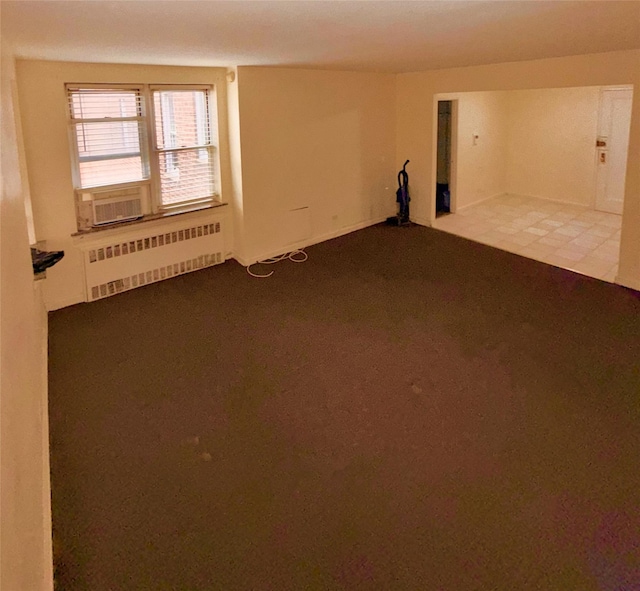 105-24 64 Unit 4L, Forest Hills, NY 11375 - unfurnished room with radiator, carpet floors, and cooling unit