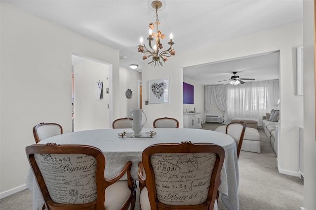 2B Kings Unit 2B, Mohegan Lake, NY 10547 - dining room featuring light colored carpet, a chandelier, and ceiling fan