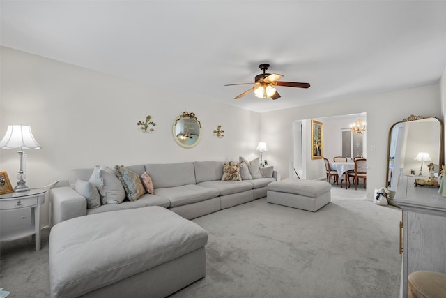 2B Kings Unit 2B, Mohegan Lake, NY 10547 - carpeted living room featuring ceiling fan and a chandelier