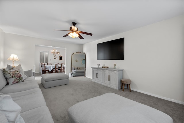 2B Kings Unit 2B, Mohegan Lake, NY 10547 - carpeted living room featuring a ceiling fan and a chandelier