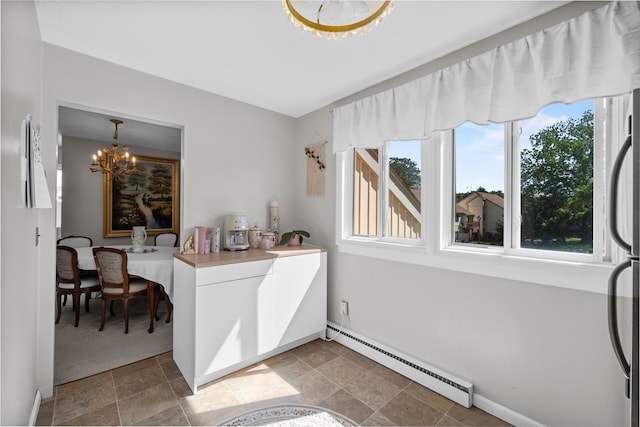 2B Kings Unit 2B, Mohegan Lake, NY 10547 - office space featuring baseboard heating, a chandelier, and light stone finish flooring