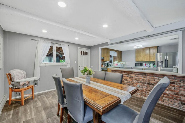 25 Biscayne Dr, Selden, NY 11784 - dining space with light wood-style flooring, beamed ceiling, recessed lighting, and baseboards