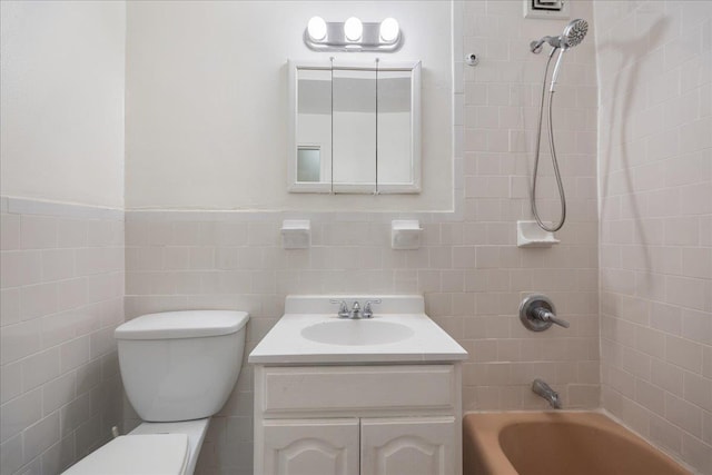 2545 Sedgwick Ave Unit 3B, Bronx, NY 10463 - bathroom featuring vanity, toilet, bathing tub / shower combination, and tile walls