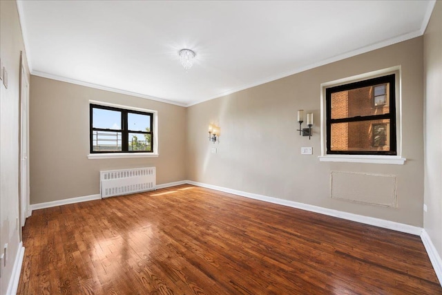 2545 Sedgwick Ave Unit 3B, Bronx, NY 10463 - unfurnished room with radiator, wood finished floors, crown molding, and baseboards