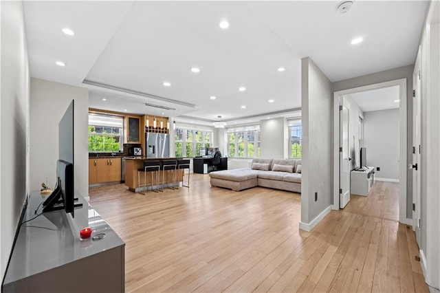 150 Oceana Dr W Unit 4B, Brooklyn, NY 11235 - living room with light wood finished floors, plenty of natural light, recessed lighting, and baseboards