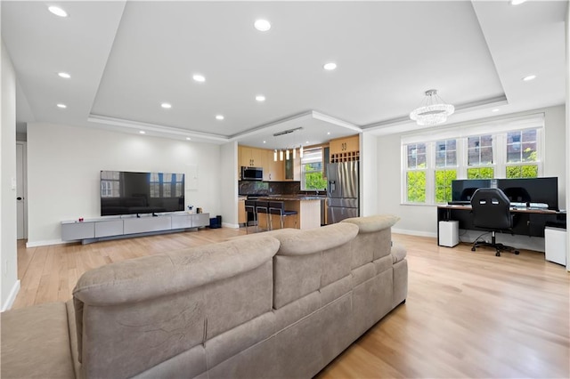 150 Oceana Dr W Unit 4B, Brooklyn, NY 11235 - living area featuring a tray ceiling, a desk, baseboards, light wood finished floors, and recessed lighting
