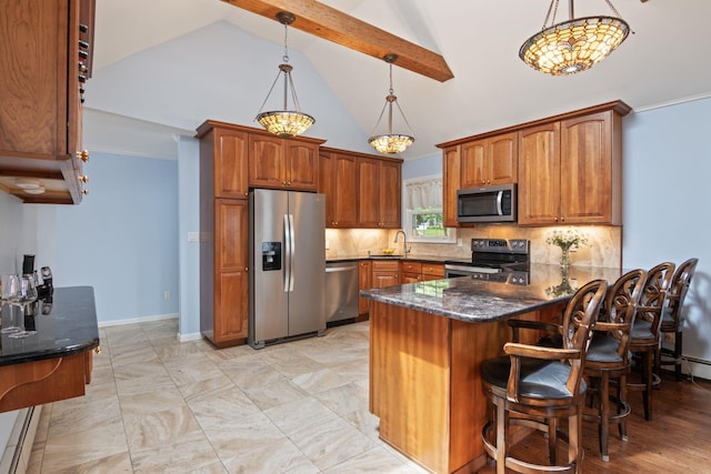 18 Chivalry Ln, Nesconset, NY 11767 - kitchen with appliances with stainless steel finishes, brown cabinetry, dark stone countertops, a peninsula, and beam ceiling